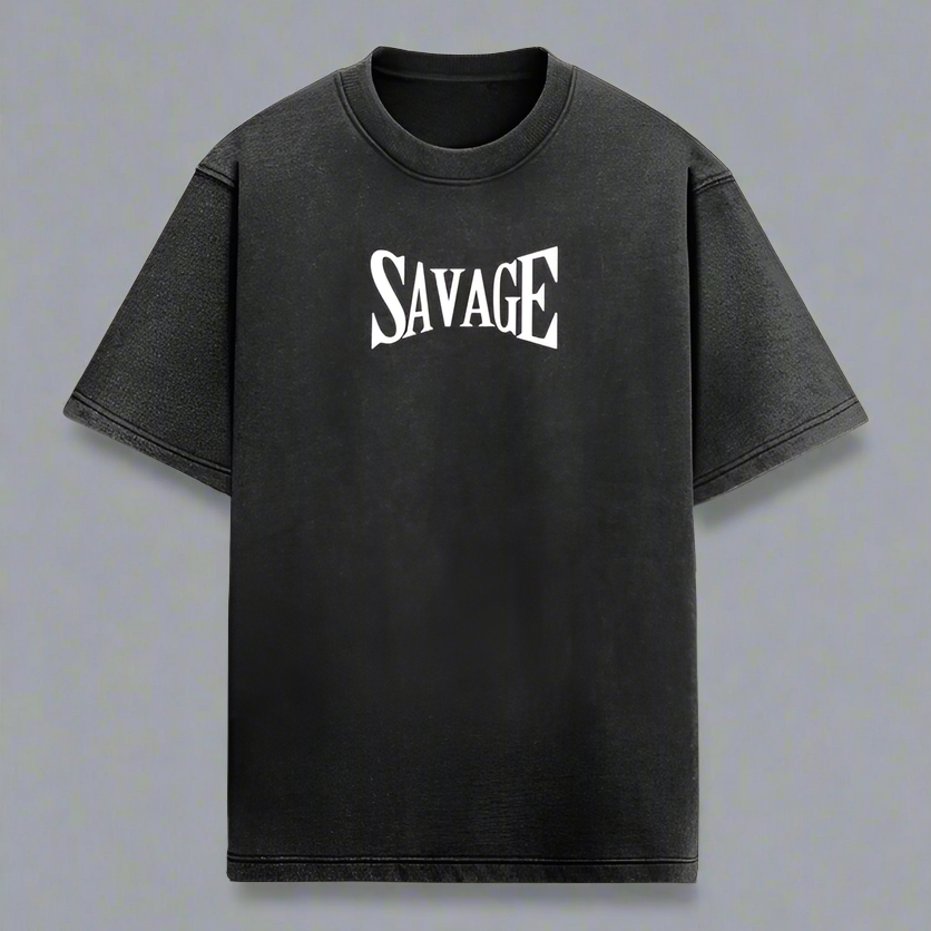 A black oversized t-shirt with the text 'SAVAGE' printed in white on the front.